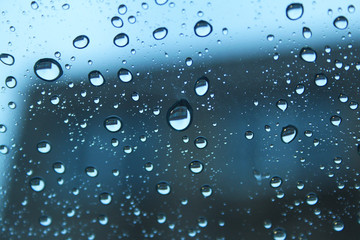 Raindrops on the clear glass