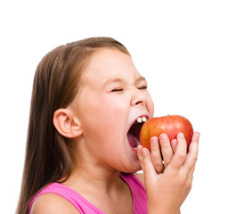 Little girl with red apple