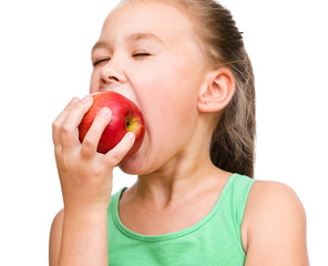 Little girl with red apple