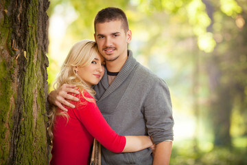 Fototapeta premium Portrait of a romantic young couple in nature
