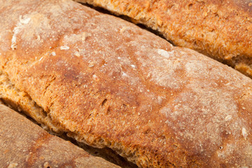 loaves of bread traditionally roasted.  Background. Close up.