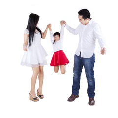 Fototapeta premium Happy family playing in studio