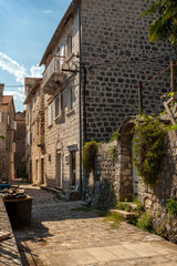 narrow street of ancient city Perast, Montenegro