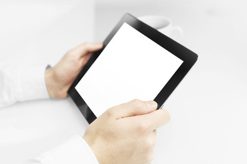 businessman holding touch pad