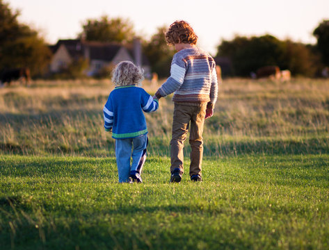 brothers holding hands