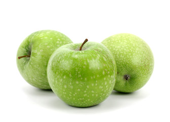 Green apples on a white background