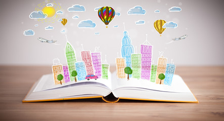 cityscape drawing on open book