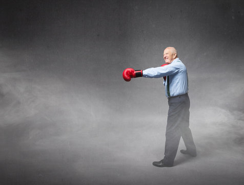 Old Man Boxing In A Profile Position