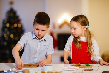 Fototapeta premium Kids baking Christmas cookies