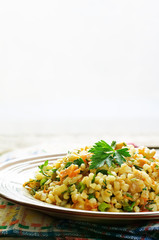 bulgur with eggplant and greens
