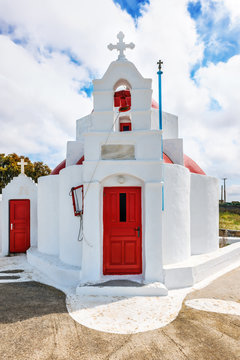 White chapel with red dome in Tourlos, Mykonos