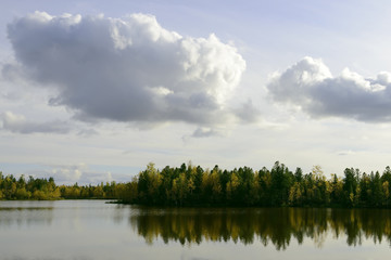 scenic autumn landscape of river and trees in northern Russia