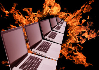 laptops row in fiery ring