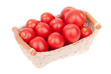 Red tomatoes in a basket.