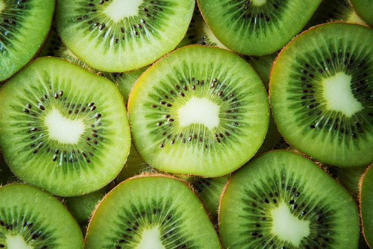 Fresh kiwi slices background