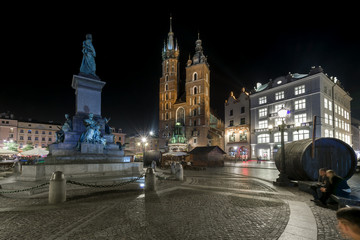 Adam Mickiewicz monument and St. Mary's Church in Krakow
