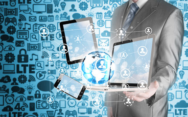 Business man using tablet PC and smartphone social connection