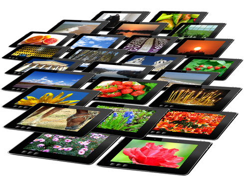 black tablets with motley pictures isolated