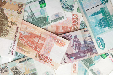 Russian money detailed background. Rubles banknotes closeup text