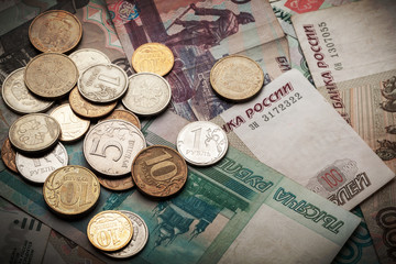 Russian money dark background. Rubles banknotes and coins