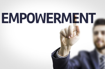 Business man pointing the text: Empowerment
