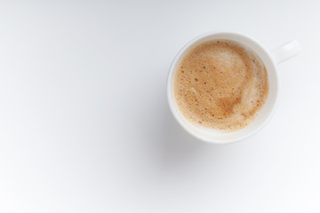 Small espresso cup. Top view on white table background