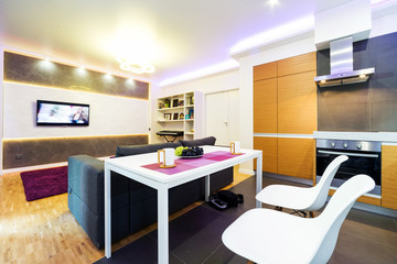 interior of modern kitchen with table and chairs