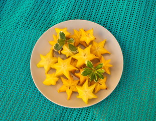 Exotic tropical fruit carambola on a plate