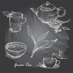 Hand drawn sketch vector tea set on blackboard.