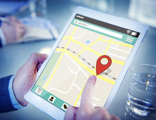 Man on a Digital Tablet using Online Map