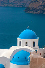 Fototapeta na wymiar dome church in Santorini Greece