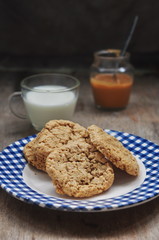 Peanut butter cookies with milk, selective focus