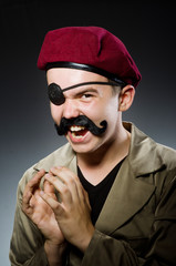 Funny soldier in military concept