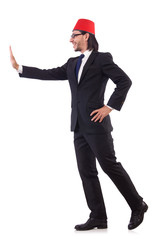 Businessman wearing fez hat isolated on white