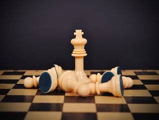 king and fallen pawns