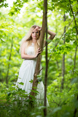 Lovely bride outdoors in a forest