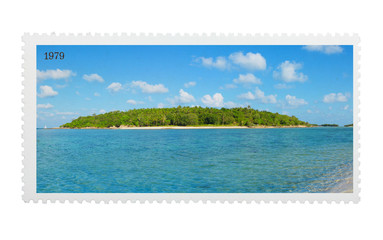 Vintage stylized postage stamp with tropical island on horizon