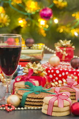 Fototapeta na wymiar Christmas Gifts, Biscuit cookies and Red Wine