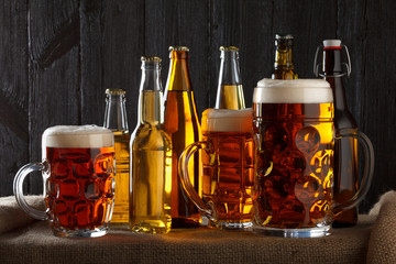 Assortment of beer glasses on table