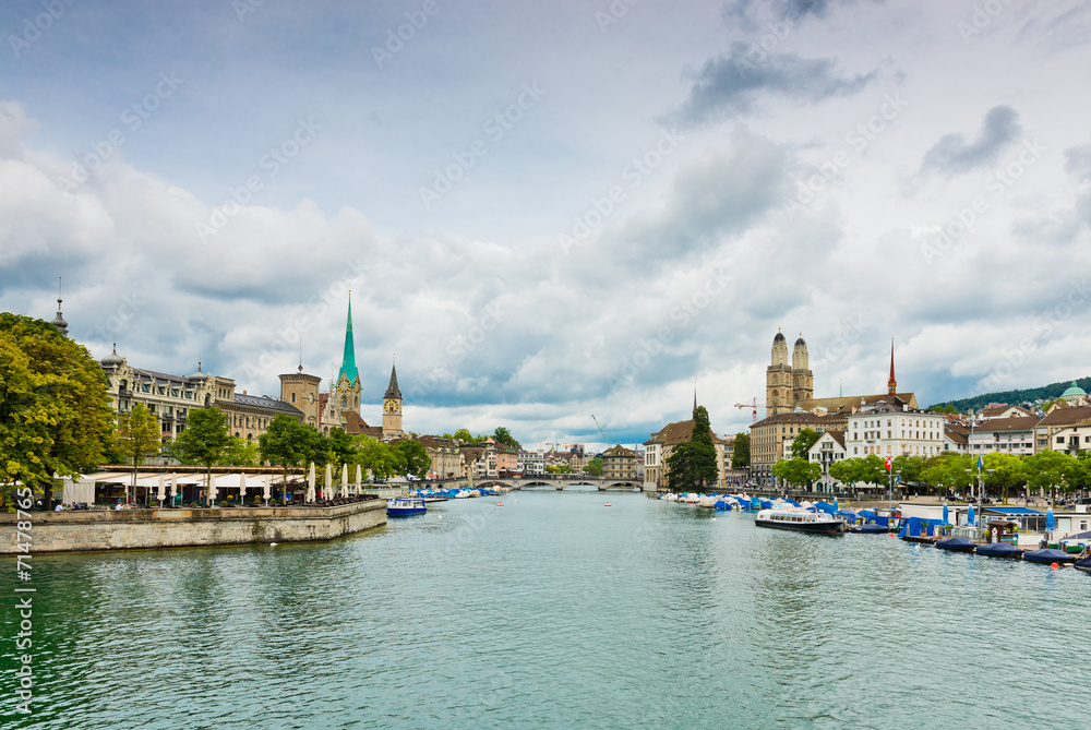 Wall mural limmat river and famous zurich churches