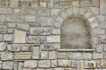 Fototapeta na wymiar Old Stone Wall with Niche