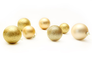 Golden Christmas Ornaments isolated on white