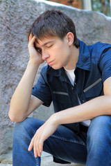 Obraz premium Sad Teenager outdoor