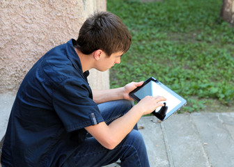 Teenager with Tablet Computer