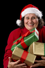 Cheerful Old Lady Offering Three Wrapped Gifts .