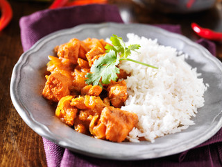 indian chicken vindaloo curry with basmati rice close up