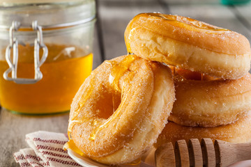 Breakfast with donuts and honey
