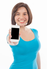 Pretty brunette presenting a smartphone (focus on the phone)
