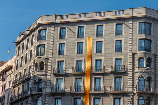 building outdoors with big catalan flag