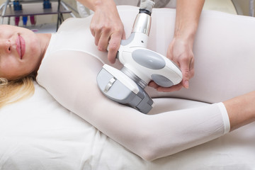 Fototapeta premium woman is in the process at the clinic lipomassage